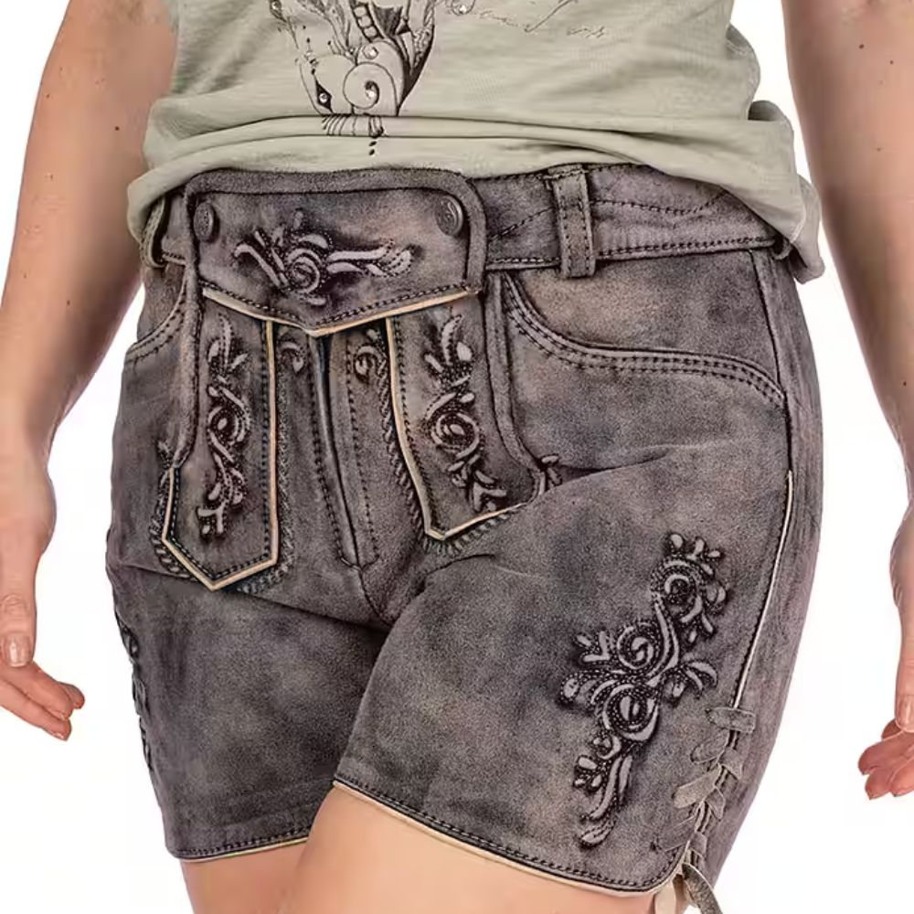 Authentic Alpine women’s grey Lederhosen shorts with traditional detailing.